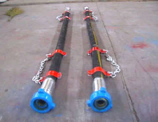 Two rotary drilling hoses are on the ground.
